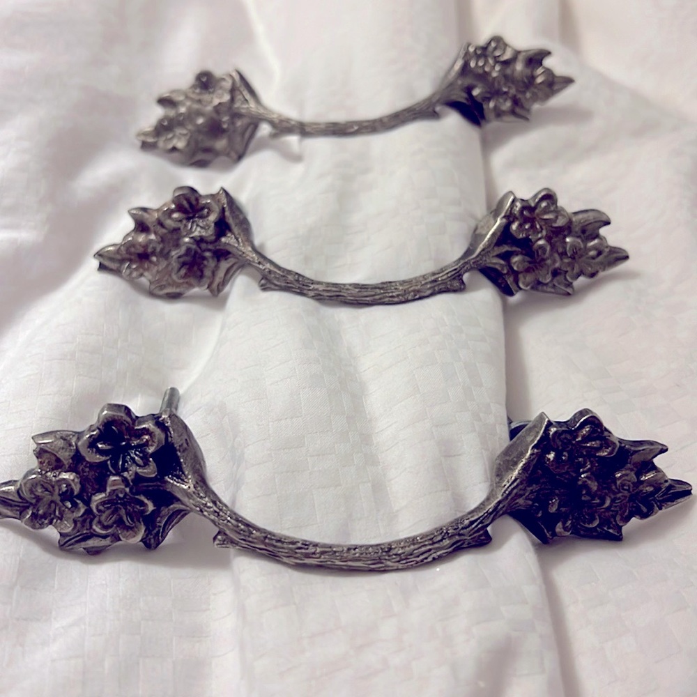 Treee Same size pewter ornate design handles. Never used.
